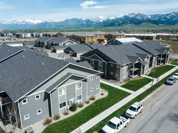 A neighborhood of homes with mountains in the background