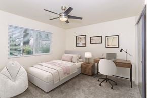Chico apartment for rent - Cozy bedroom with bed and study area in Gateway Apartments student housing Chico, CA