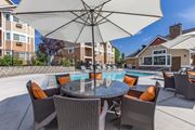 West Richland apartment for rent - our apartments have a large pool and patio with chairs and umbrellas. Poolside lounge area