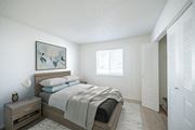 Pocatello apartment for rent - a bedroom with a bed and a dresser at Kirkwood Meadows, Pocatello, Idaho