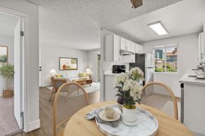 Fife apartment for rent - A dining room with a table set for two.