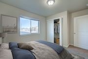 Bozeman apartment for rent - a bedroom with a bed and a closet and a window  at Madison Park, Bozeman, 59718