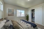Bozeman apartment for rent - a bedroom with a bed and a closet with a window  at Madison Park, Bozeman, 59718