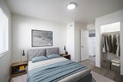 Pocatello apartment for rent - a bedroom with a bed and a closet at Summit, Pocatello, ID 83201