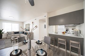 Pocatello apartment for rent - a living room and dining room with a table and chairs