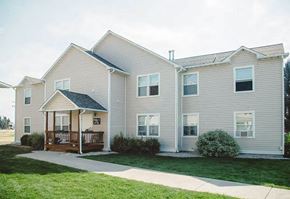 Belgrade apartment for rent - A two-story house with a front porch.