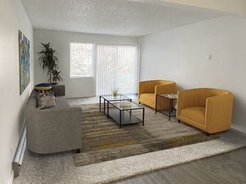 Twin Falls apartment for rent - a living room with couches and chairs and a rug