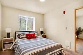 Bellingham apartment for rent - a bedroom with a bed and a window at Sky Vue, Bellingham, WA
