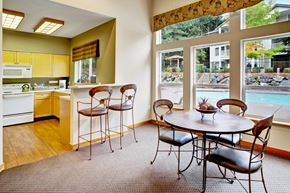 Everett apartment for rent - Kitchen with dining table and chairs at Sunrise Lane Apartments in Everett WA