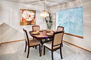 Everett apartment for rent - Dining room with table and chairs at Sunrise Lane Apartments in Everett WA