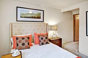 Everett apartment for rent - Bedroom with upholstered headboard at Sunrise Lane Apartments Everett WA