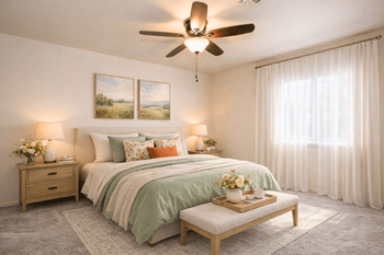Master bedroom with sage green accents and bench