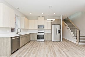 Chicago apartment for rent - a kitchen with a stainless steel refrigerator and a sink