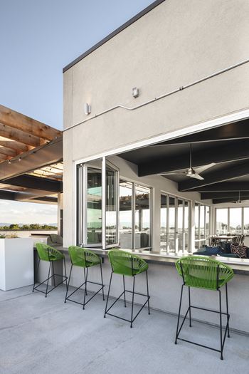 Rooftop access with sun deck lounge