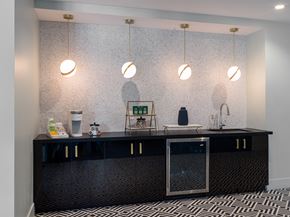Los Angeles apartment for rent - a bathroom with two sinks and a mirror with lights on it