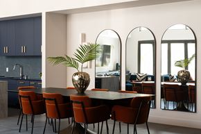 Los Angeles apartment for rent - a dining room with a table and chairs and three mirrors
