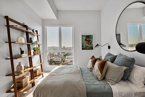 Los Angeles apartment for rent - a bedroom with a bed and a large window