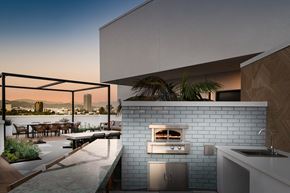 Los Angeles apartment for rent - a kitchen with a stove and a city in the background