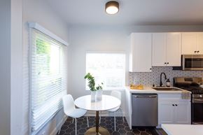 Los Angeles apartment for rent - Dining Area With Hardwood Flooring, Breakfast Bar, Ceiling Fan and Modern Light Fixtures
