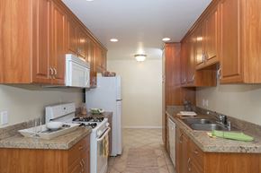 Los Angeles apartment for rent - Homey kitchen with wooden cabinets and white accents