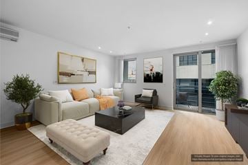 Berkeley apartment for rent - A modern living room with a white sofa, a black coffee table, and a large painting on the wall.
