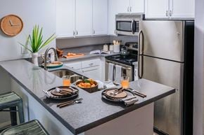 Los Angeles apartment for rent - Modern Kitchen with a Breakfast Bar, Energy Efficient Appliances, and Wood Style Flooring
