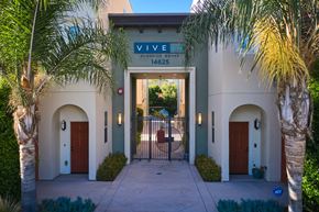 Sherman Oaks apartment for rent - Exterior entrance bracketed by palm trees