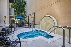 Los Angeles apartment for rent - Outdoor hot tub surrounded by pool chairs