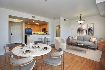 Sherman Oaks apartment for rent - a living room and dining room with a table and chairs