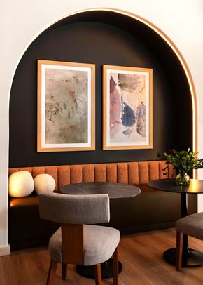 Dublin apartment for rent - A modern dining area with a round table and two chairs.