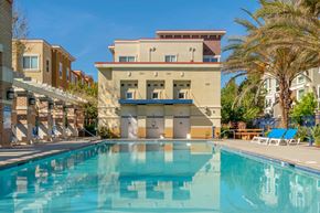 Dublin apartment for rent - a swimming pool with a building in the background