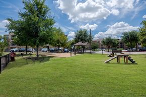 Mckinney apartment for rent - a park with a picnic area and a playground at Discovery at Craig Ranch, Texas