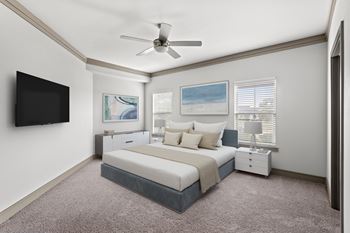 Modern bedroom with platform bed and wall mounted tv