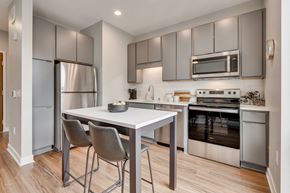 Minneapolis apartment for rent - Kitchen Area with Stainless Steel Appliances at Marquee, Minneapolis, MN, 55403