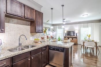 Kitchen with wood cabinets