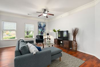 A living room with a couch and a tv
