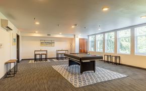 Vancouver apartment for rent - 134th street lofts resident lounge and game room with a ping pong table and chairs