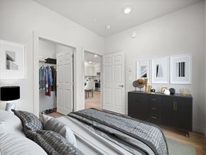 Spokane apartment for rent - a bedroom with a bed and a closet