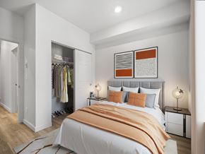 Spokane apartment for rent - a bedroom with a bed and a closet
