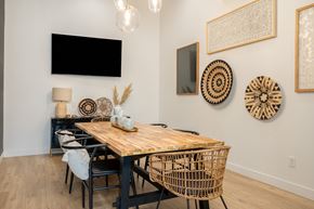 Albany apartment for rent - A dining room with a wooden table and chairs.