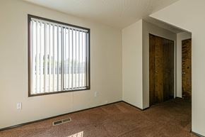 Albany apartment for rent - A room with a window and a door.
