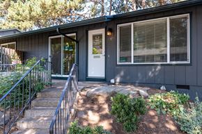 Salem apartment for rent - the front entrance of a house with a white door and stairs