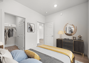 Spokane apartment for rent - a bedroom with a bed and a closet