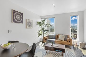 Spokane apartment for rent - a living room with a couch and a table and a window