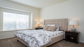 Wilsonville apartment for rent - Village at Main Street | Bedroom with Large Light Filled Window