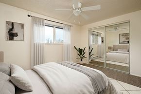 Salem apartment for rent - A bedroom with a large bed and a ceiling fan.