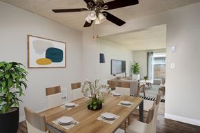 Salem apartment for rent - A dining room with a wooden table set for four.