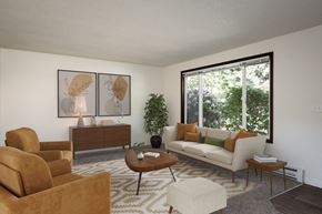 Salem apartment for rent - a living room with a white couch and a large window