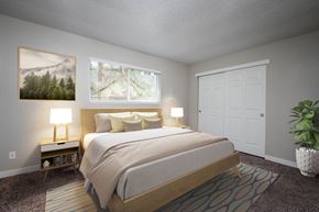 Portland apartment for rent - a bedroom with a bed and a window