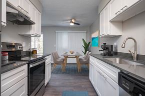 Portland apartment for rent - a kitchen and dining room with a table and chairs